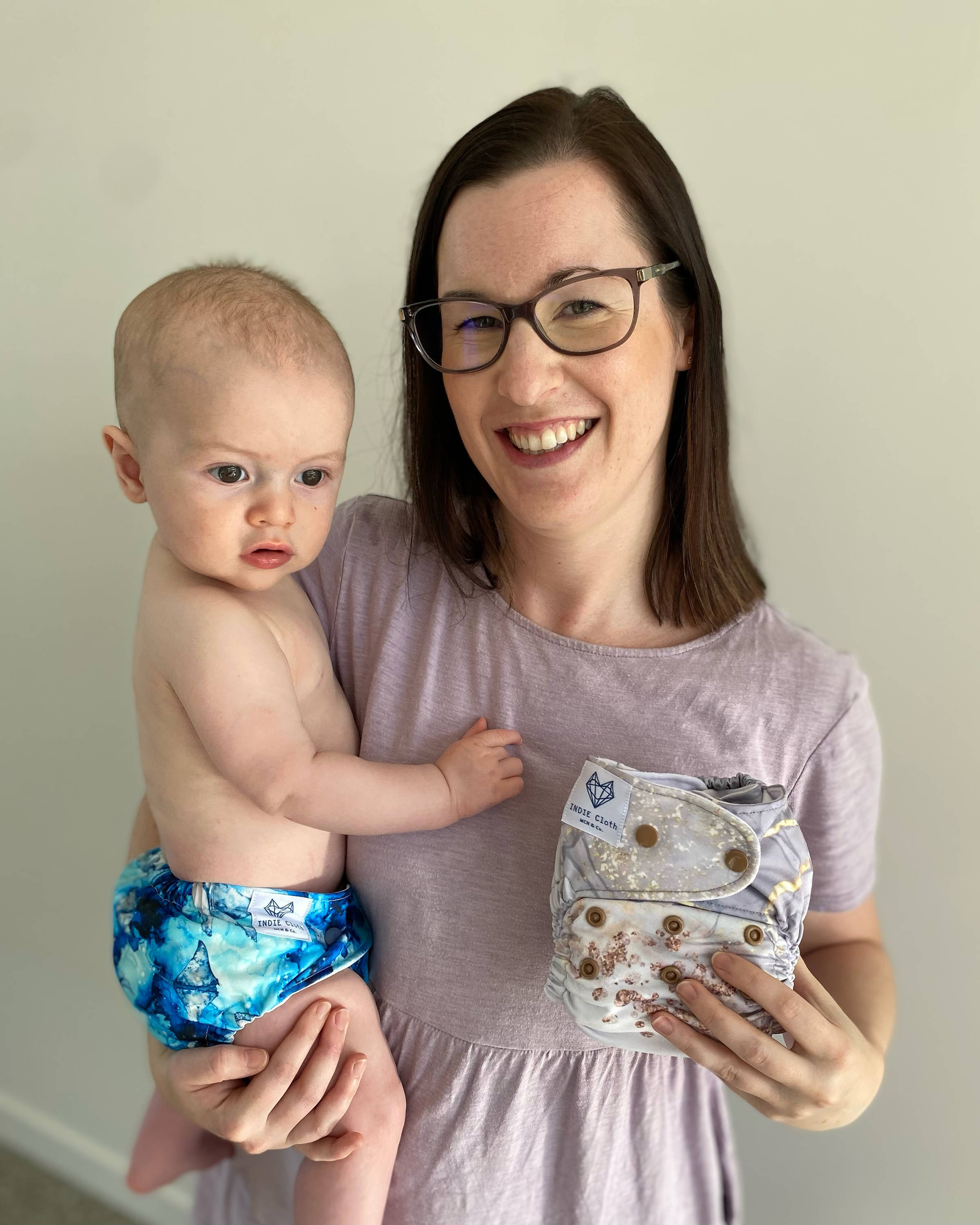 Hayley Klop with baby Axel modelling one of her cloth nappies.