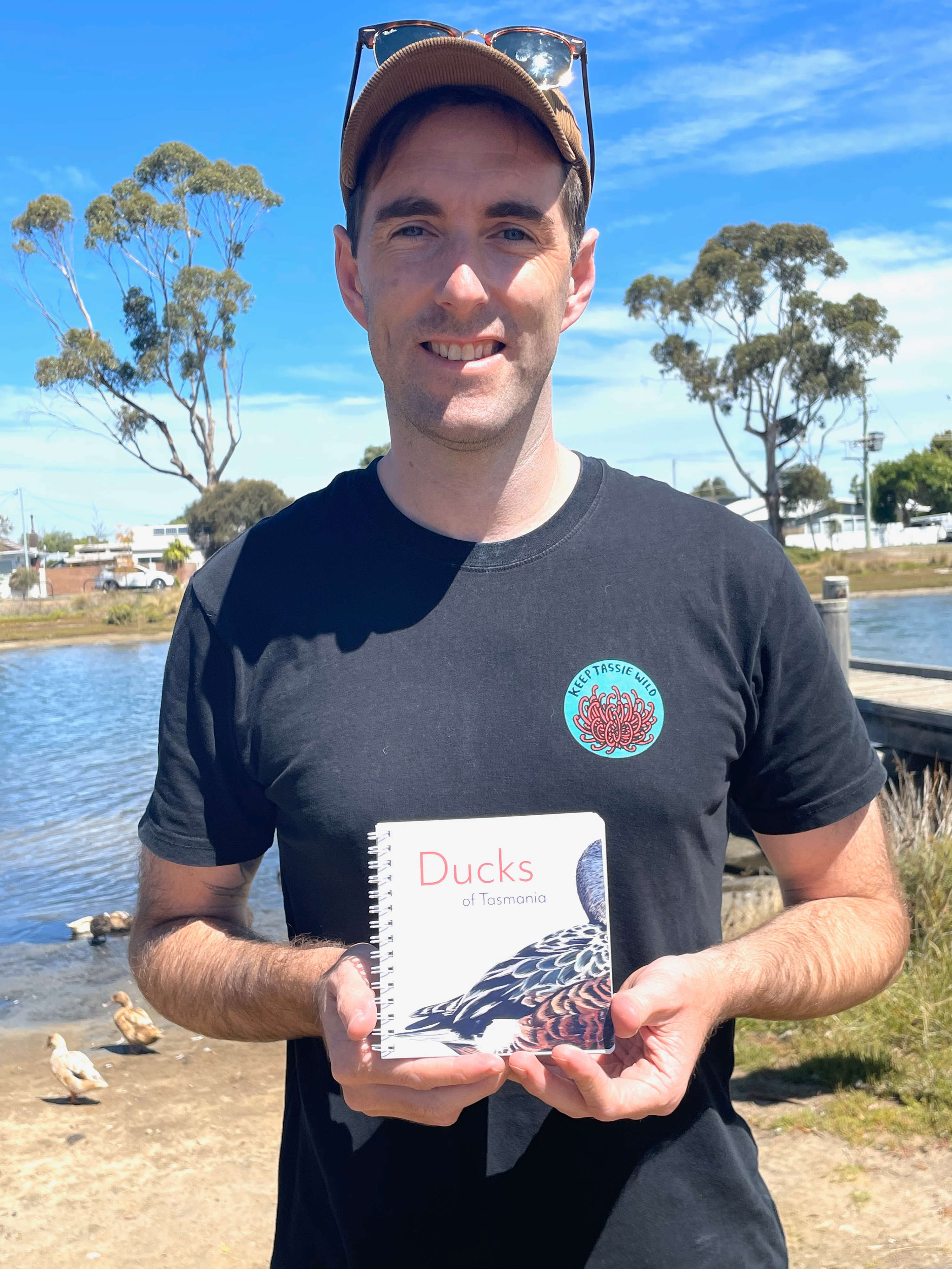 Pacific Black Duck Conservation Group convenor Jason Graham with the new Ducks of Tasmania booklet.